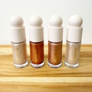 New! RARE BEAUTY Bundle of 4 Liquid Highlighters Enlighten (2), Reveal & Flaunt